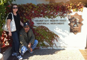 At the Hearst Castle visitor center, next to the signage.